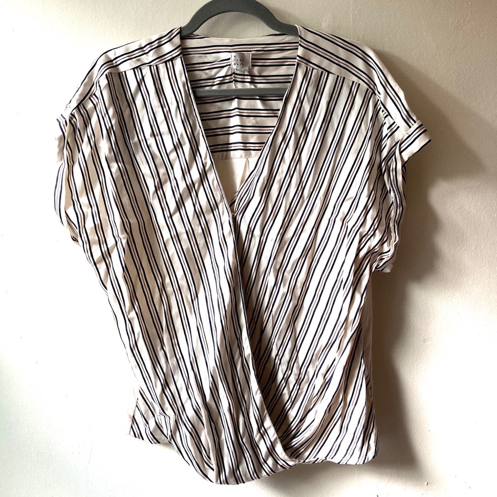Clasp front short sleeve top with stripes